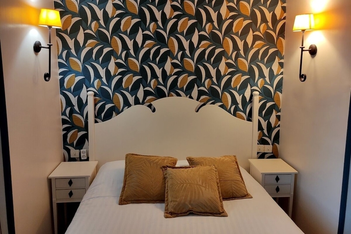 Imagen de la habitación del Hotel Le Pavillon Saint Martin. Foto 11