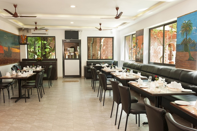 Imagen del bar/restaurante del Hotel Le Pearl Goa Resort and Spa. Foto 5