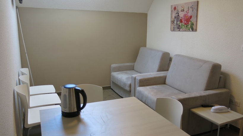 Imagen de la habitación del Hotel Le Pelerin. Foto 14