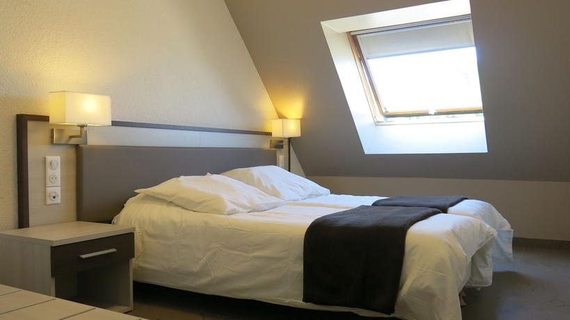 Imagen de la habitación del Hotel Le Pelerin. Foto 15