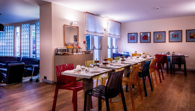 Imagen del bar/restaurante del Hotel Le Pergolese Paris Champs Elysées. Foto 7