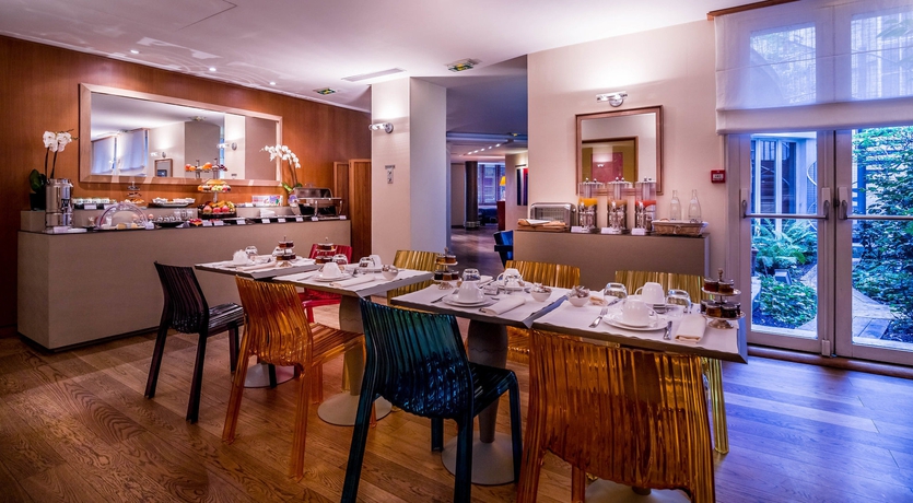 Imagen del bar/restaurante del Hotel Le Pergolese Paris Champs Elysées. Foto 8