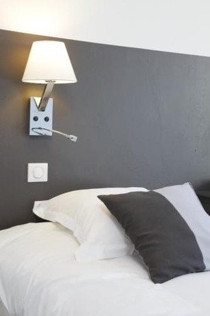 Imagen de la habitación del Hotel Le Perigord. Foto 9