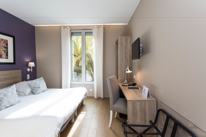 Imagen de la habitación del Hotel Le Petit Castel. Foto 3
