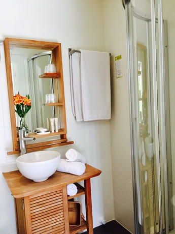 Imagen de la habitación del Hotel Le Petit Castel. Foto 12