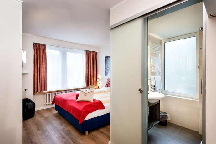 Imagen de la habitación del Hotel Le Petit Charme-inn. Foto 13