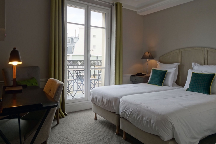 Imagen de la habitación del Hotel Le Petit Chomel. Foto 6