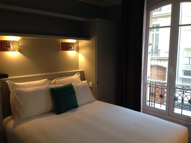 Imagen de la habitación del Hotel Le Petit Chomel. Foto 11