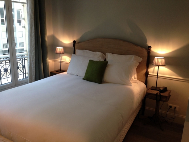 Imagen de la habitación del Hotel Le Petit Chomel. Foto 12