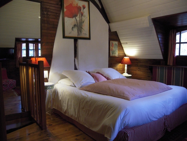 Imagen de la habitación del Hotel Le Petit Coq Aux Champs. Foto 11