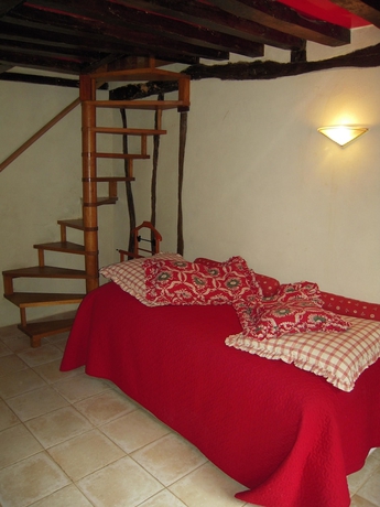 Imagen de la habitación del Hotel Le Petit Coq Aux Champs. Foto 12