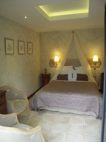 Imagen de la habitación del Hotel Le Petit Coq Aux Champs. Foto 18