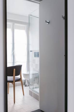 Imagen de la habitación del Hotel Le Petit Cosy. Foto 8