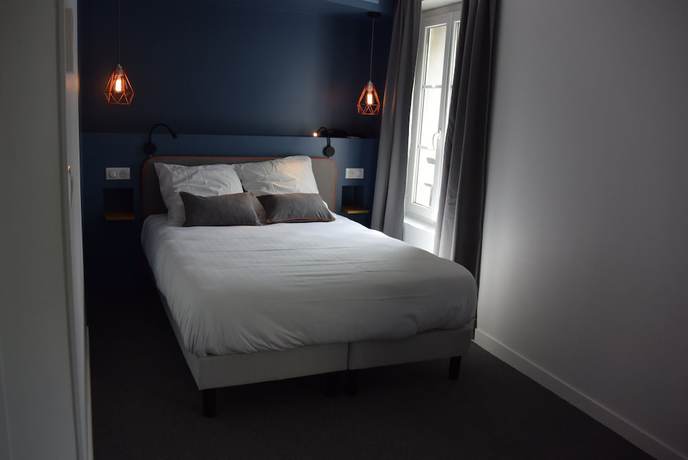 Imagen de la habitación del Hotel Le Petit Cosy. Foto 9