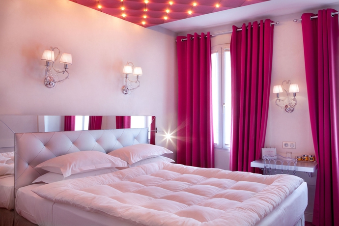 Imagen de la habitación del Hotel Le Petit Madeleine Hotel. Foto 8