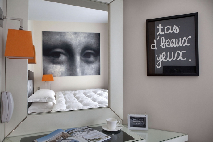 Imagen de la habitación del Hotel Le Petit Madeleine Hotel. Foto 10