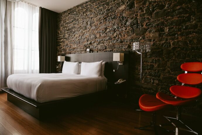 Imagen de la habitación del Hotel Le Petit Notre Dame. Foto 5