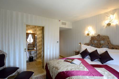 Imagen de la habitación del Hotel Le Petit Palais D'aglaé. Foto 5