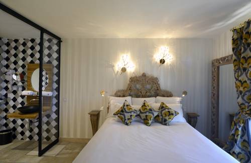 Imagen de la habitación del Hotel Le Petit Palais D'aglaé. Foto 10