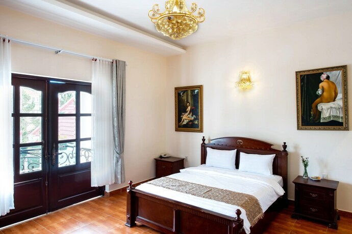 Imagen de la habitación del Hotel Le Petit Paris, Da Lat. Foto 3