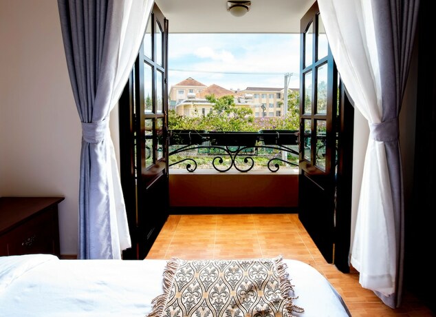 Imagen de la habitación del Hotel Le Petit Paris, Da Lat. Foto 7