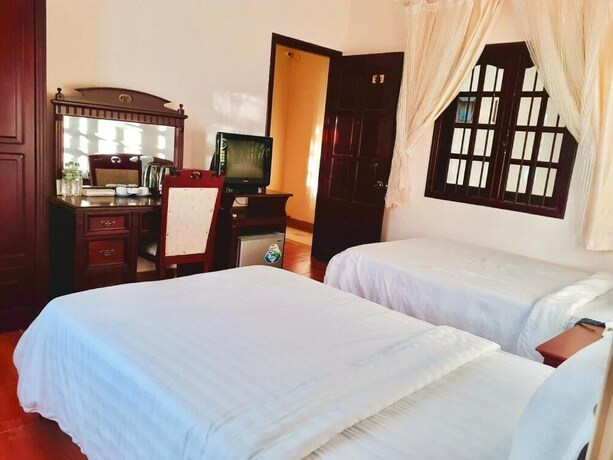 Imagen de la habitación del Hotel Le Petit Paris, Da Lat. Foto 9