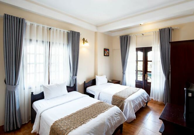 Imagen de la habitación del Hotel Le Petit Paris, Da Lat. Foto 13