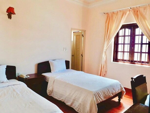 Imagen de la habitación del Hotel Le Petit Paris, Da Lat. Foto 17