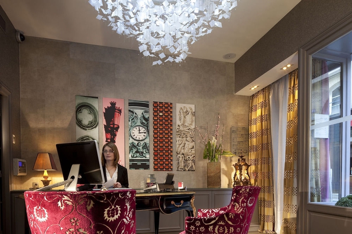 Imagen de los interiores del Hotel Le Petit Paris, París. Foto 12