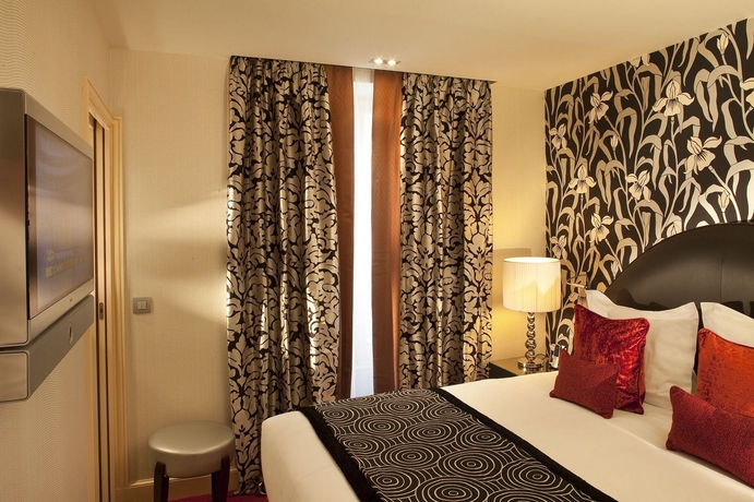 Imagen de la habitación del Hotel Le Petit Paris, París. Foto 8