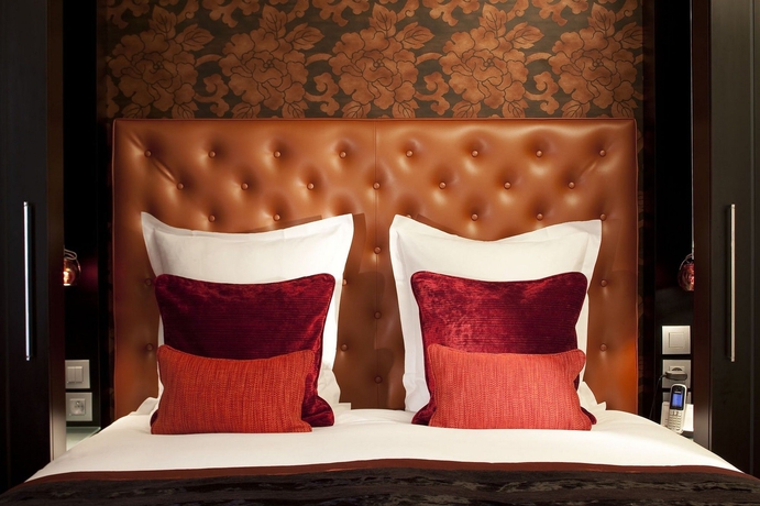 Imagen de la habitación del Hotel Le Petit Paris, París. Foto 10