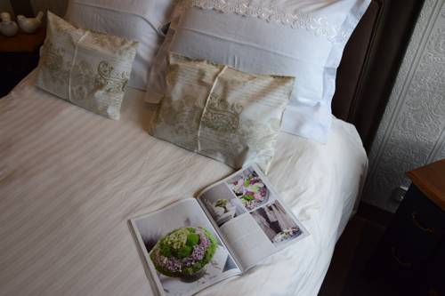 Imagen de la habitación del Hotel Le Petit Relais. Foto 4