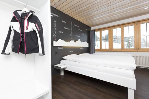Imagen de la habitación del Hotel Le Petit Relais, Gstaad . Foto 8
