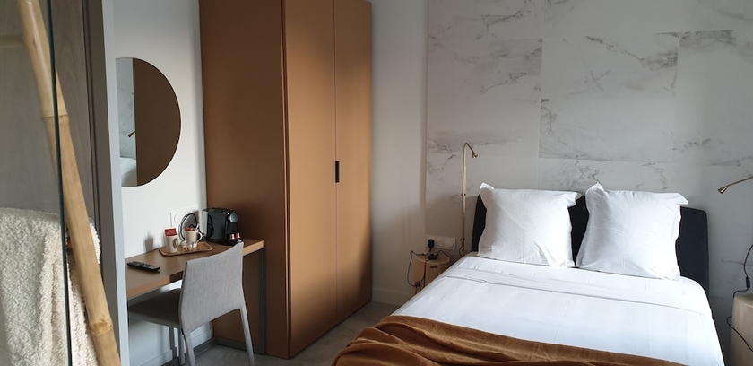 Imagen de la habitación del Hotel Le Petit Trianon Et Le Charme Des Suites. Foto 6