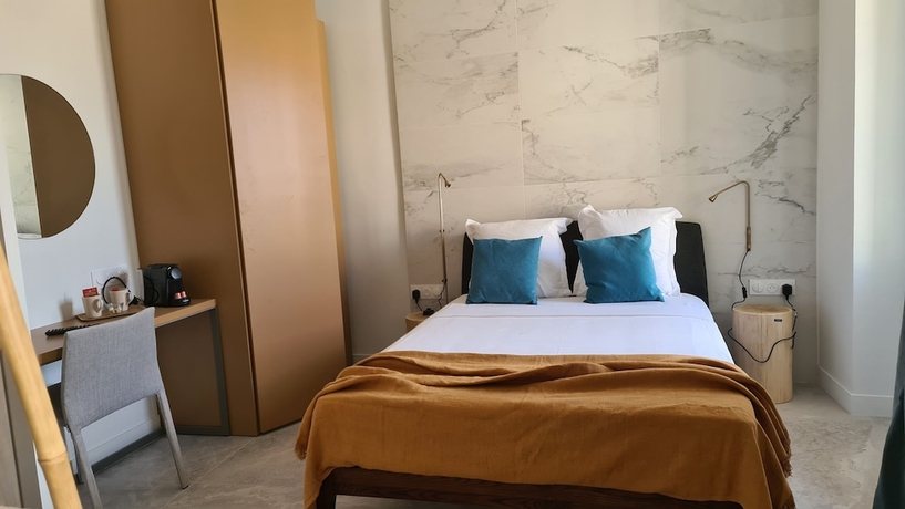 Imagen de la habitación del Hotel Le Petit Trianon Et Le Charme Des Suites. Foto 7