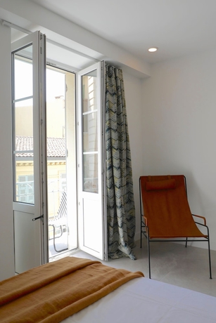Imagen de la habitación del Hotel Le Petit Trianon Et Le Charme Des Suites. Foto 9