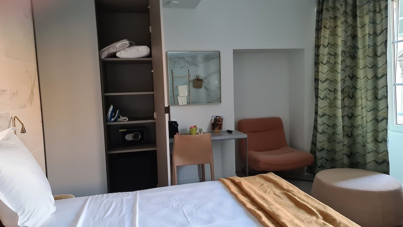 Imagen de la habitación del Hotel Le Petit Trianon Et Le Charme Des Suites. Foto 15
