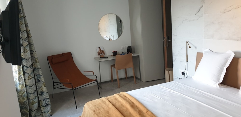 Imagen de la habitación del Hotel Le Petit Trianon Et Le Charme Des Suites. Foto 16
