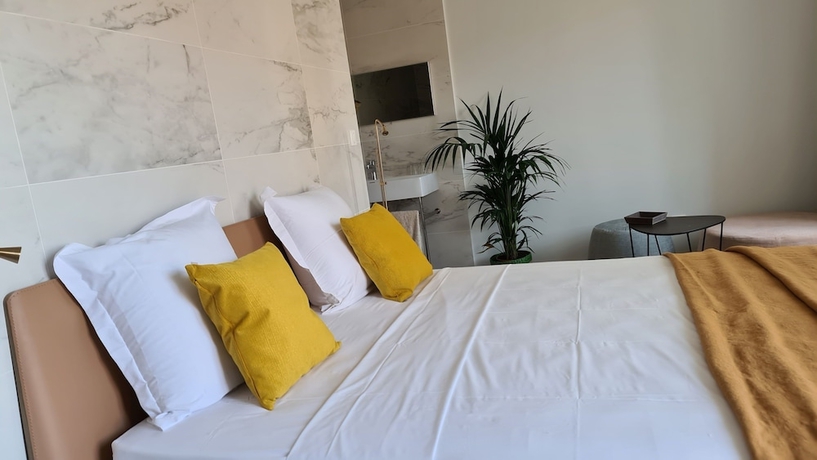 Imagen de la habitación del Hotel Le Petit Trianon Et Le Charme Des Suites. Foto 17