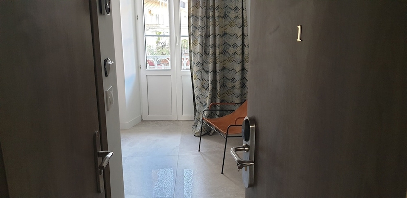 Imagen de la habitación del Hotel Le Petit Trianon Et Le Charme Des Suites. Foto 18