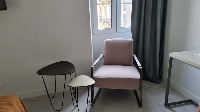 Imagen de la habitación del Hotel Le Petit Trianon Et Le Charme Des Suites. Foto 19