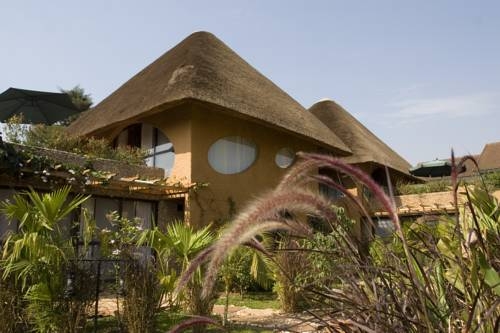 Imagen de la habitación del Hotel Le Petit Village. Foto 2