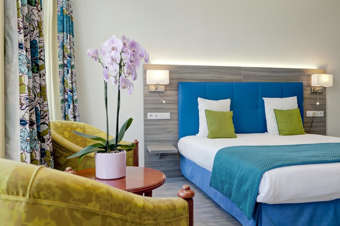 Imagen de la habitación del Hotel Le Phenix. Foto 2