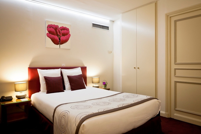 Imagen de la habitación del Hotel Le Phenix. Foto 4