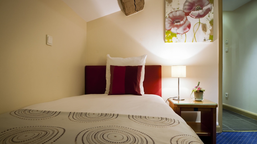 Imagen de la habitación del Hotel Le Phenix. Foto 5