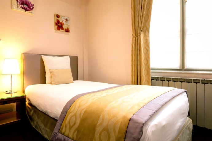 Imagen de la habitación del Hotel Le Phenix. Foto 6