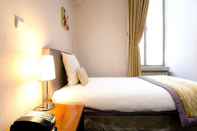 Imagen de la habitación del Hotel Le Phenix. Foto 11