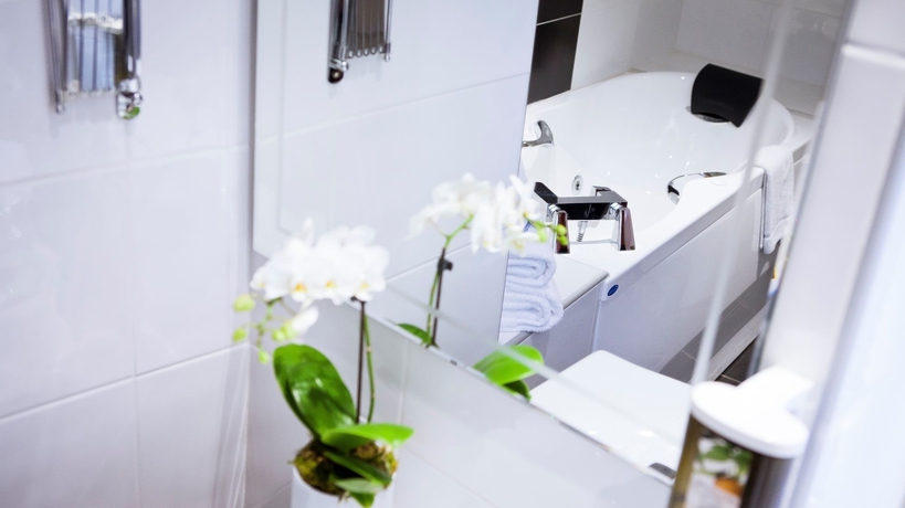 Imagen de la habitación del Hotel Le Phenix. Foto 13