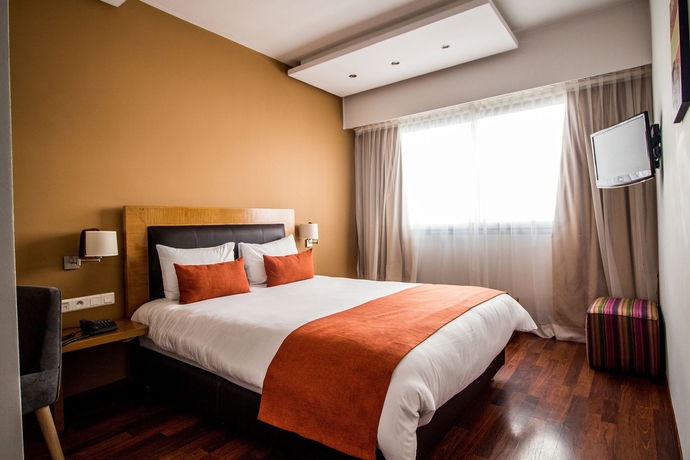 Imagen de la habitación del Hotel Le Pietri Urban. Foto 9