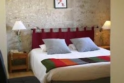 Imagen de la habitación del Hotel Le Pigeonnier Du Perron. Foto 3